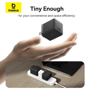 Baseus Palm Series 30W compact USB-C charger shown on a hand for size reference, portability view.