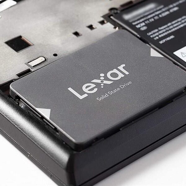 Lexar NS100 128GB 2.5-inch SATA SSD installed in a laptop, ideal internal SSD upgrade with fast boot-up.