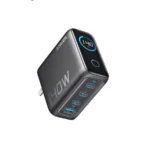 Anker Prime Charger 140W (B2697) in dark gray angled view showing smart display and 4 charging ports.